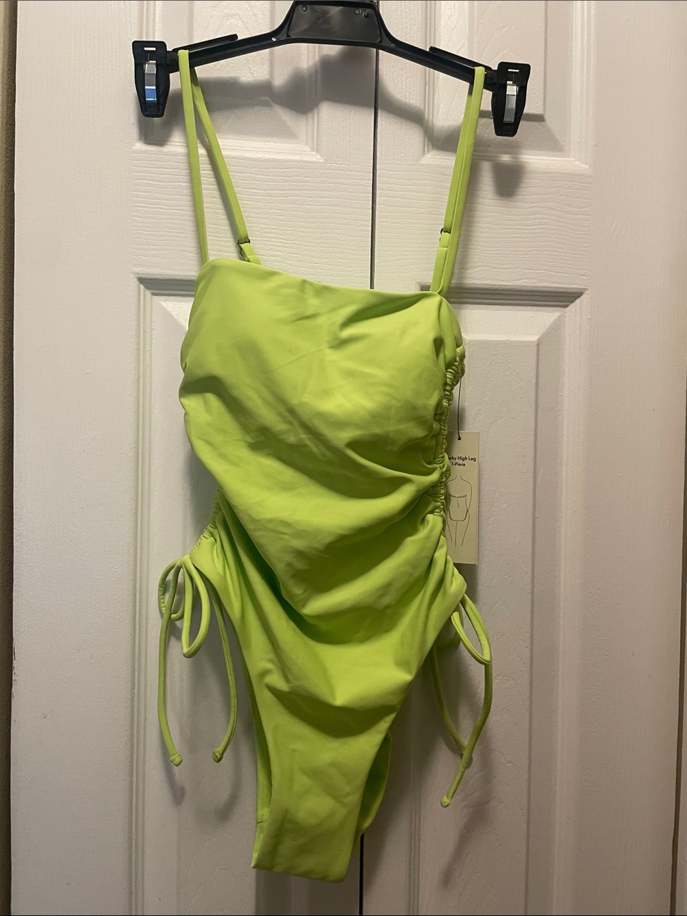 Women’s Lime Green One-Piece Swim Suit with Adjustable Ties and cover-up skirt